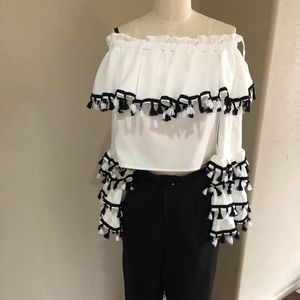 White off the shoulder fiesta  top & black pants